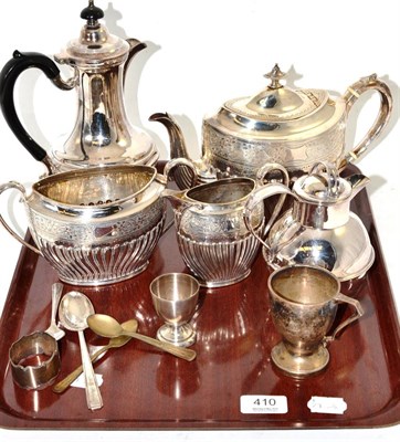 Lot 410 - A three piece tea service comprising a Victorian silver teapot and the matching plated sugar...