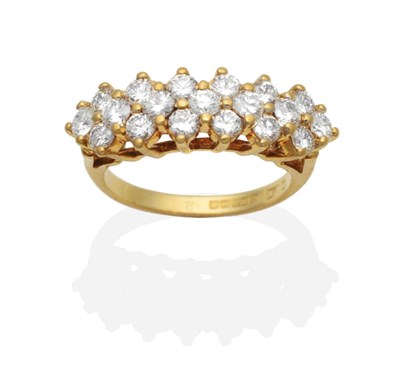 Lot 421 - An 18 Carat Gold Diamond Half Hoop Ring, three rows of round brilliant cut diamonds in claw...