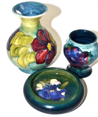 Lot 428 - Three pieces of Moorcroft, consisting two vases and an ash tray (3)