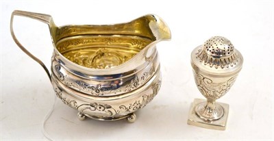 Lot 435 - A George III silver milk jug and a P & A Bateman pepperette