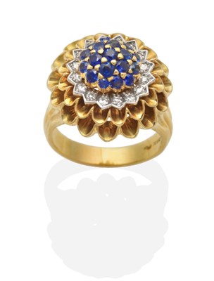 Lot 422 - A Sapphire and Diamond Cluster Ring, by Tiffany & Co, a central cluster of round cut sapphires...