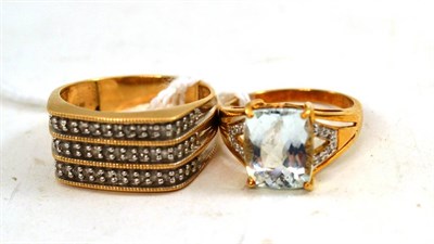 Lot 477 - A 9ct gold aquamarine and diamond ring and a 9ct gold diamond ring (2)