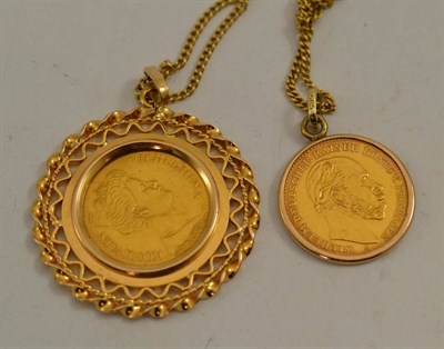 Lot 479 - Two coin pendants on a chain