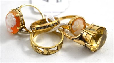 Lot 499 - Two cameo rings, a citrine ring, a 9ct gold band ring and eternity ring (5)