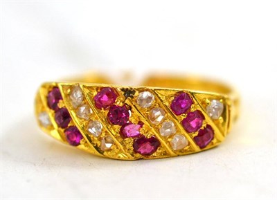 Lot 500 - An 18ct gold diamond and ruby ring