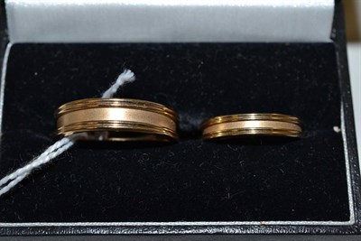 Lot 505 - Two 9ct gold matching band rings