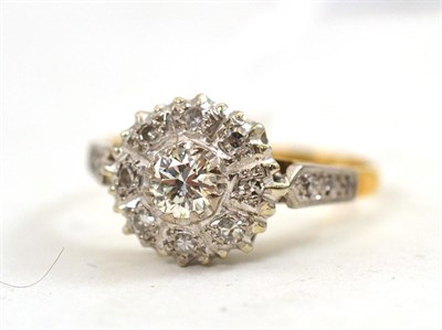 Lot 506 - An 18ct gold diamond cluster ring