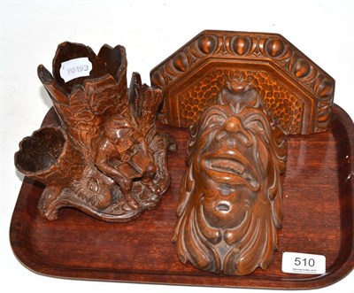 Lot 510 - A Black Forest carved desk tidy and a wall bracket