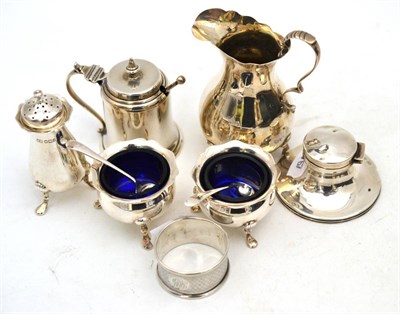 Lot 564 - A collection of silver including a pair of salts, a mustard, pepper, cream jug, inkwell and a...