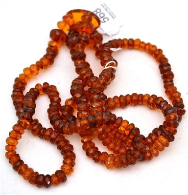 Lot 568 - A set of amber beads