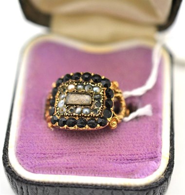 Lot 585 - A mourning ring dated ";1827";, set with seed pearls and French jet (a.f.)