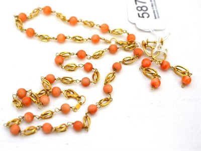 Lot 587 - A coral necklace, a coral bracelet and a pair of coral drop earrings