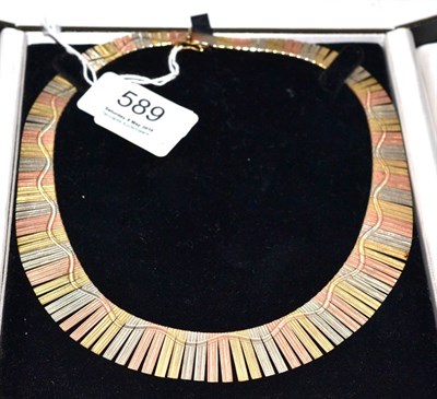 Lot 589 - A 9ct multi-coloured gold collar, boxed