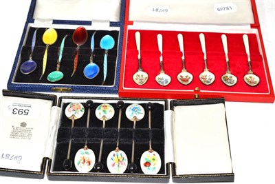 Lot 593 - Three sets of enamelled silver coffee spoons for six, in fitted cases