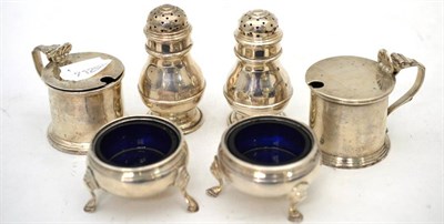 Lot 598 - A set of six silver table condiments