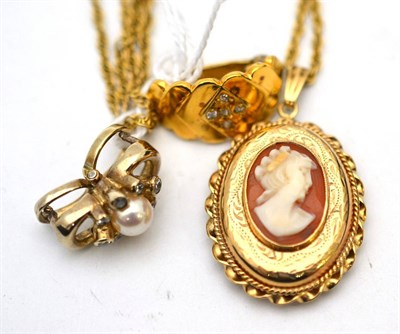 Lot 602 - A 9ct gold cameo locket pendant on chain and two pearl strand clip-ons