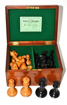 Lot 606 - A Jaques & Son ";Genuine Staunton Chessmen Two Prize Medals Awarded";, a weighted and stained chess