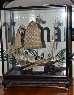 Lot 612 - A Chinese export white metal model of a junk, with a presentation case