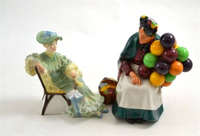 Lot 614 - Two Royal Doulton figures; The Old Balloon Seller and Ascot