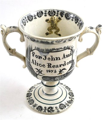 Lot 620 - A blue and white footed loving cup