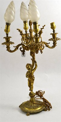 Lot 635 - A gilt brass cherub candelabra light fitting