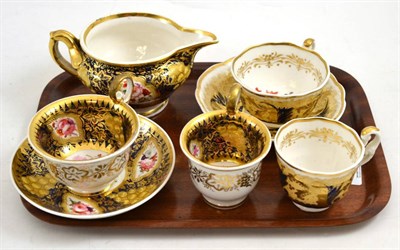 Lot 636 - A Coalport trio and matching jug and another trio (7)