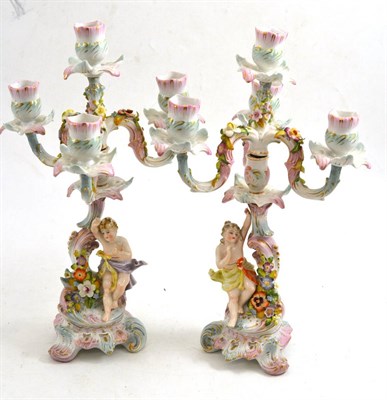 Lot 654 - A pair of Sitzendorf candelabra