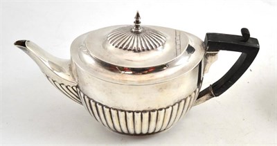 Lot 664 - A silver teapot, Walker & Hall, London 1905