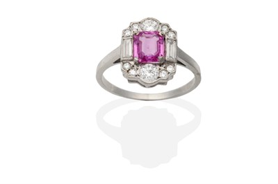 Lot 459 - An Art Deco Style Pink Sapphire and Diamond Cluster Ring, an octagonal cut pink sapphire within...