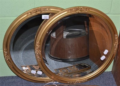 Lot 701 - Two circular bevel edged mirrors