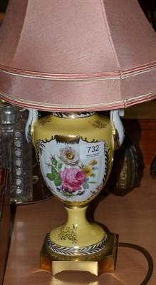 Lot 732 - A painted porcelain urn shaped lamp base