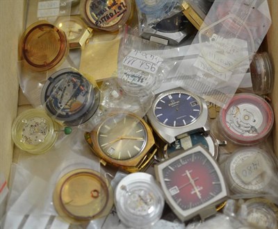 Lot 754 - A box of wristwatch movements and watches