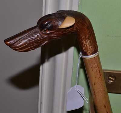 Lot 760 - Late Victorian walking stick carved with a dogs head