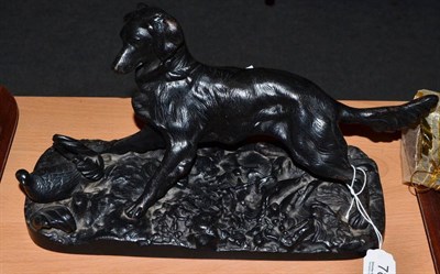 Lot 782 - Russian cast iron group of a hunting dog