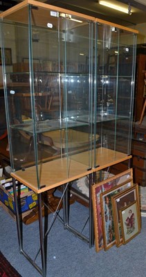 Lot 1008 - A pair of modern glazed display units on metal stands