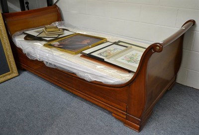 Lot 1016 - A modern mahogany sleigh bed and mattress