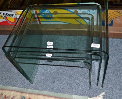 Lot 1026 - A nest of three plate glass tables