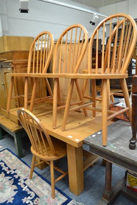 Lot 1029 - A modern beech kitchen table, a set of six pine kitchen chairs, a modern pine standing corner...