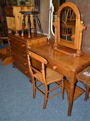 Lot 1040 - A modern pine dressing table, dressing mirror, chest of drawers, bedside cabinet, carved oak...