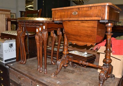 Lot 1049 - Victorian walnut sewing table, reproduction nest of tables, an elbow chair and a mirror