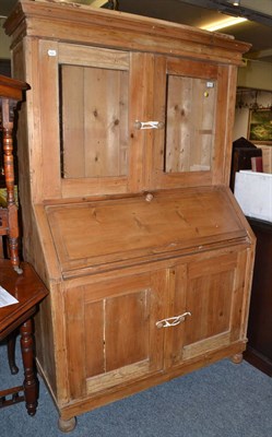 Lot 1053 - A Victorian pine bureau bookcase