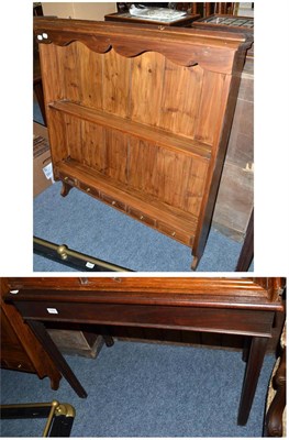 Lot 1059 - A 19th century mahogany side table (altered) and a pine hanging rack