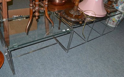 Lot 1099 - A chrome and glass coffee table of three sections and another similar and smaller (2)