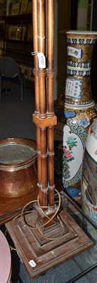 Lot 1100 - A mahogany cluster column standard lamp in Georgian style