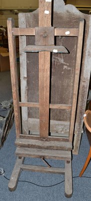 Lot 1109 - Late 19th century oak easel stand