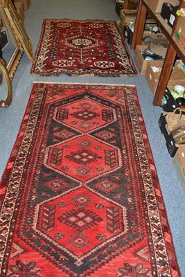 Lot 1178 - Kashgai rug, South West Persia, the claret field with central stepped medallion framed by...