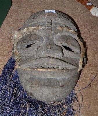 Lot 1181 - A Nigerian tribal carved wood mask