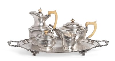 Lot 510 - A George V Silver Four Piece Tea Service, James R Ogden, London 1931, of circular form, the...