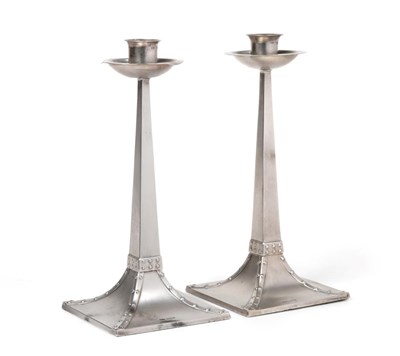 Lot 513 - A Pair of Arts & Crafts Silver Candlesticks, James Dixon & Son, Sheffield 1919, the design probably