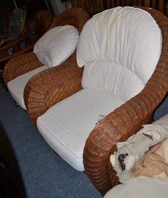 Lot 1211 - A pair of wicker chairs with cushions